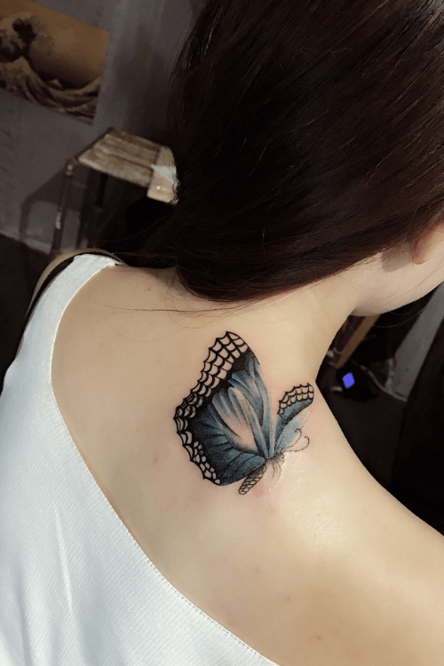 black and blue butterfly tattoo on neck