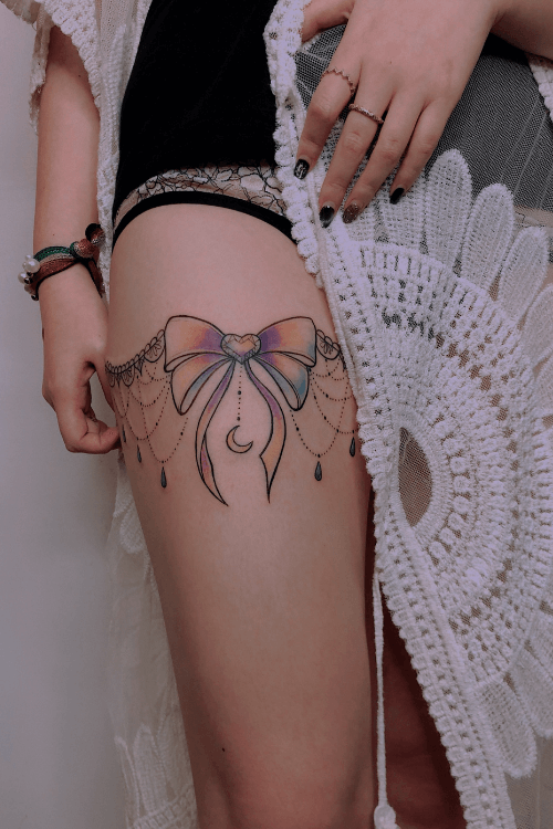 color buterfly tattoo on leg