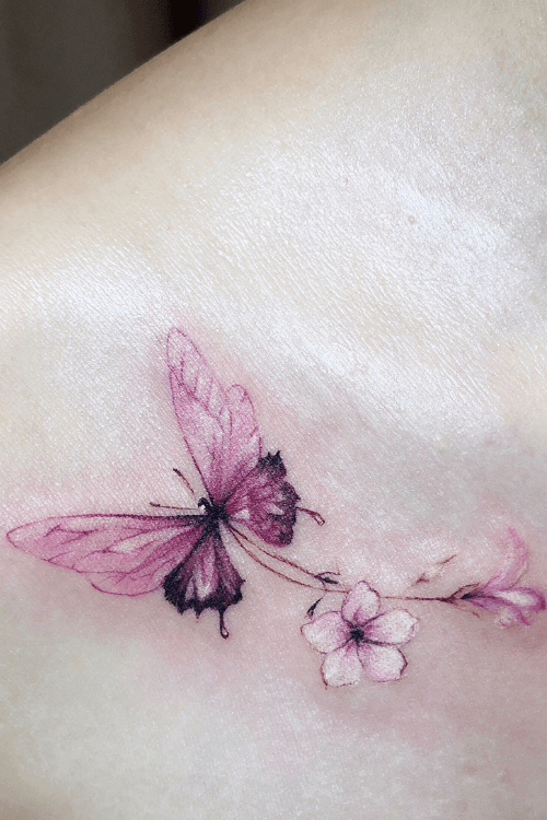 pink butterfly tattoo