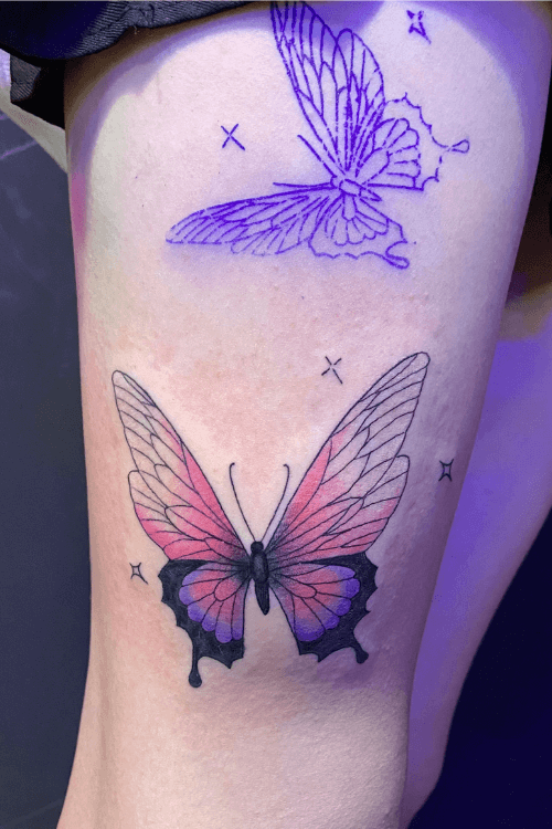 purple butterfly tattoo arm